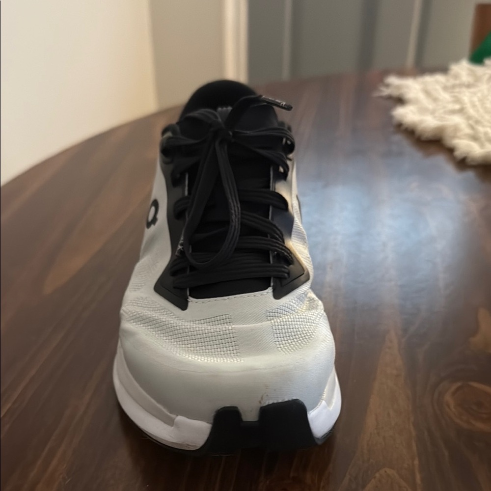 On Running Black and White Athletic Shoes